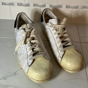 Adidas consortium slam jam white lace up sneakers.